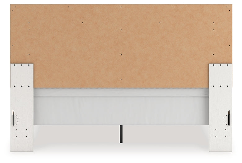 Zuraleus King Upholstered Panel Bed, Dresser, Mirror, Chest and Nightstand